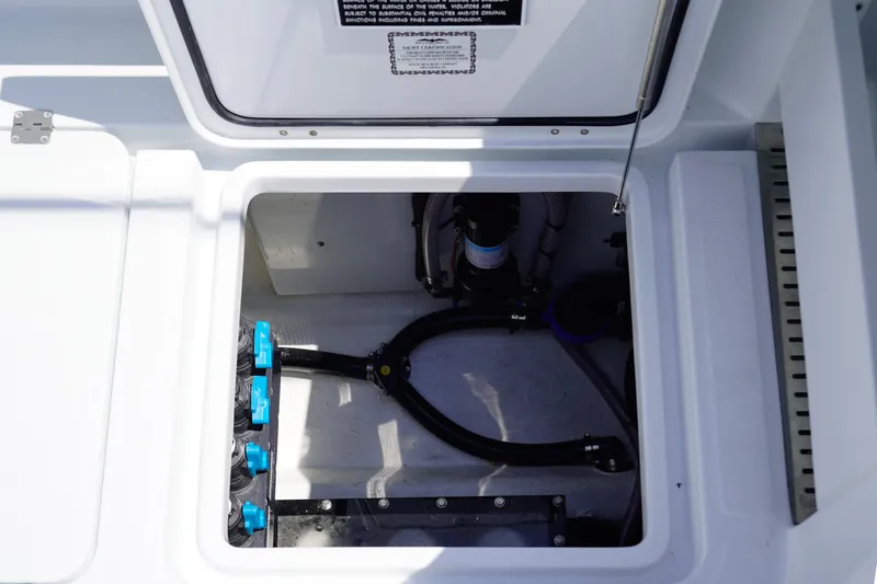  Yacht Photos Pics Access hatch of 2026 Invincible 40 Catamaran showing internal components and wiring.