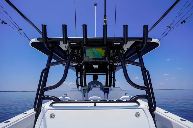  Yacht Photos Pics 2026 Invincible 40 Catamaran on calm waters, featuring advanced navigation system.