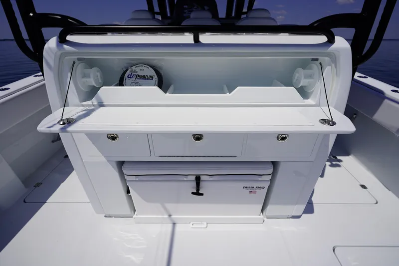  Yacht Photos Pics 2026 Invincible 40 Catamaran fishing station with storage drawers and cooler.