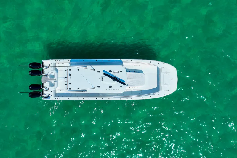  Yacht Photos Pics Aerial view of 2026 Invincible 40 Catamaran on turquoise water.