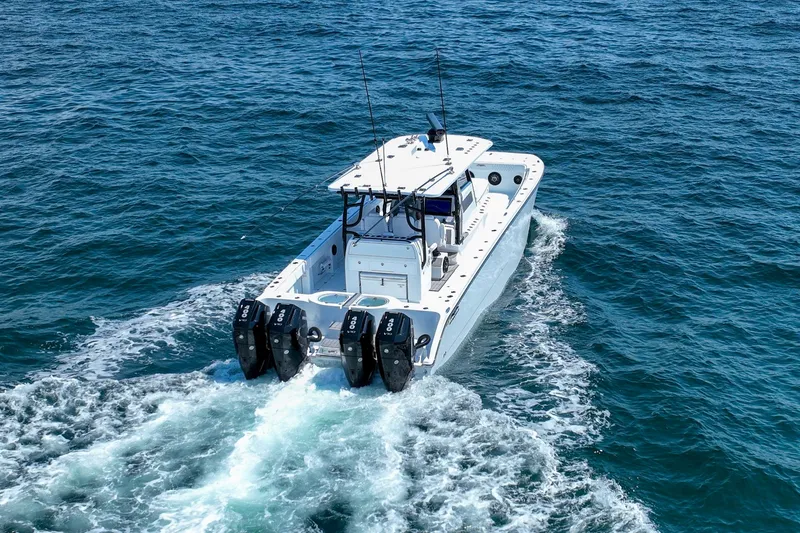  Yacht Photos Pics Invincible 40 Catamaran 2026 cruising on open ocean waters.