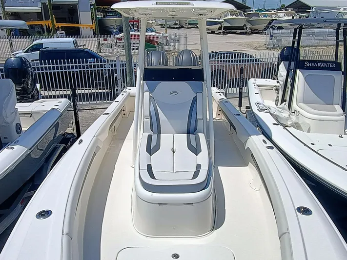 270-912 Yacht Photos Pics 2024 ShearWater 270 Carolina SS Open Bow boat, sleek design, docked at marina.