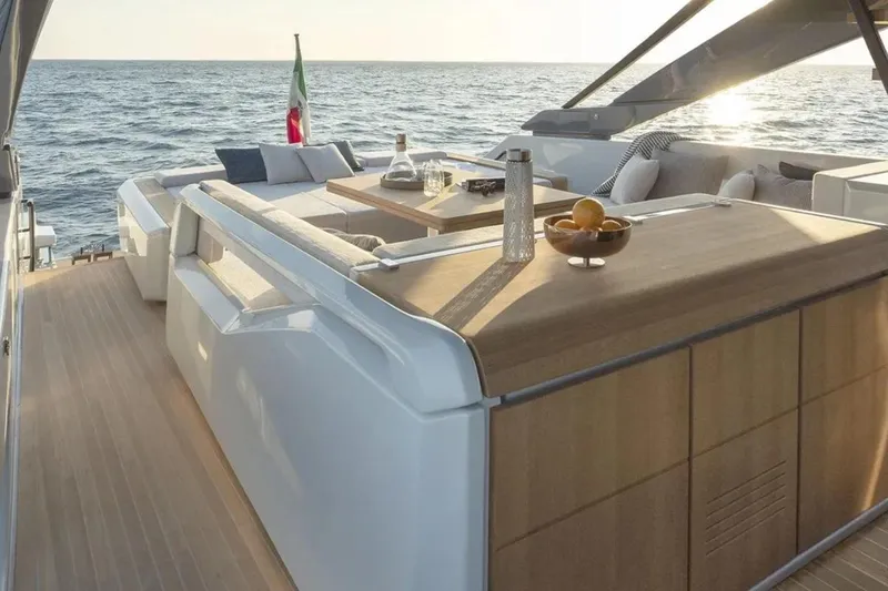  Yacht Photos Pics Luxurious 2025 Bluegame BG74 yacht deck with elegant seating and ocean view.