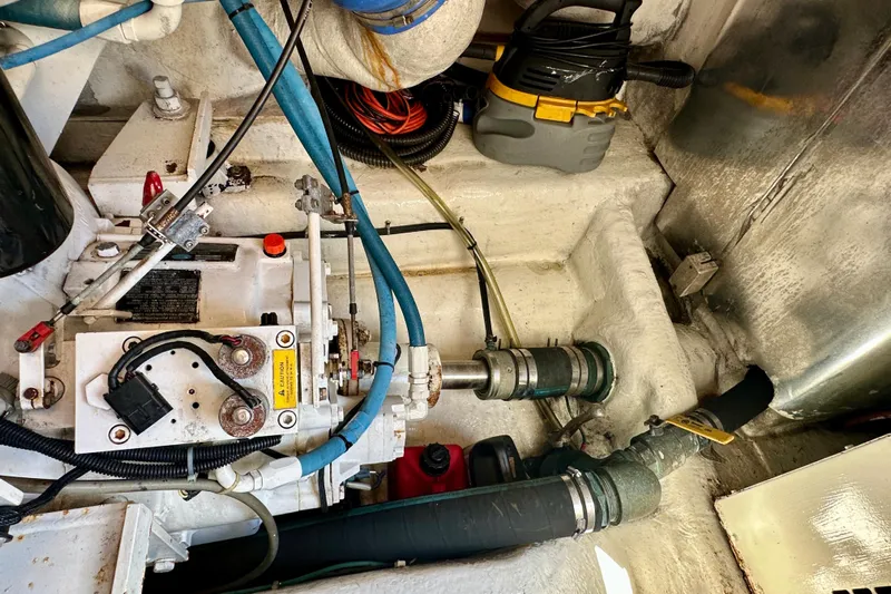 Gold Coast Yacht Photos Pics Engine room of 2005 Ocean Yachts 50 Super Sport with visible mechanical components.