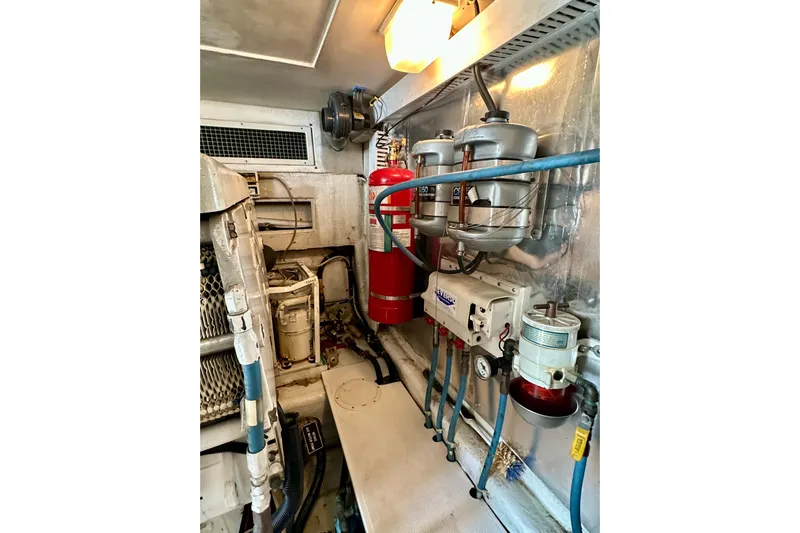 Gold Coast Yacht Photos Pics Fire suppression, coolant recovery bottles, oil exchanger and Racor fuel filters