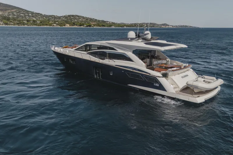 Scuderia Yacht Photos Pics Luxury 2010 Absolute 70 STY yacht cruising on open water.