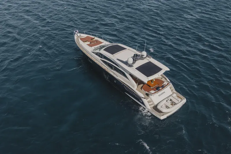 Scuderia Yacht Photos Pics Luxury yacht Absolute 70 STY 2010 cruising on open sea, aerial view.