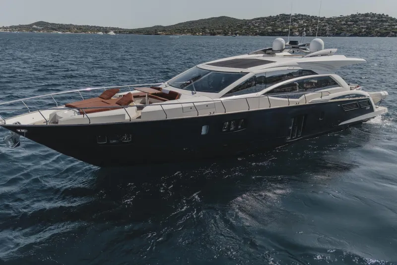 Scuderia Yacht Photos Pics Luxury 2010 Absolute 70 STY yacht cruising on open water.