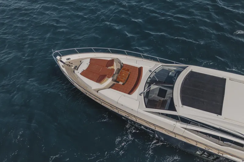 Scuderia Yacht Photos Pics Aerial view of 2010 Absolute 70 STY yacht cruising on the ocean.