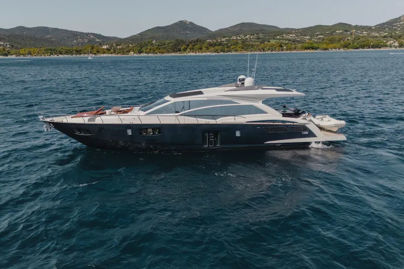 Scuderia Yacht Photos Pics Luxury 2010 Absolute 70 STY yacht cruising on scenic blue waters.