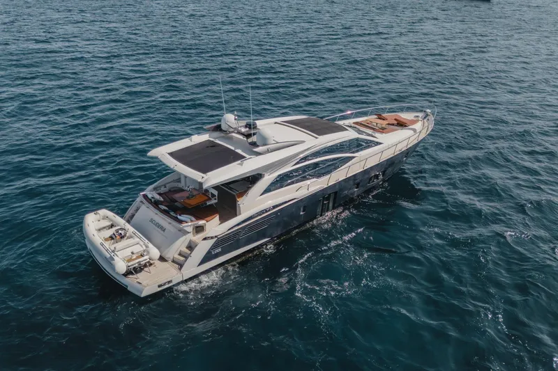 Scuderia Yacht Photos Pics Luxury yacht Absolute 70 STY 2010 cruising on open sea, aerial view.