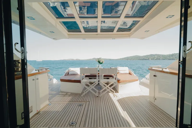 Scuderia Yacht Photos Pics Luxurious 2010 Absolute 70 STY yacht with elegant deck and stunning ocean view.