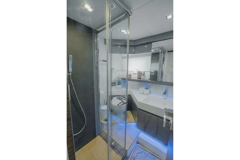 Scuderia Yacht Photos Pics Luxurious bathroom in 2010 Absolute 70 STY yacht with modern fixtures and sleek design.