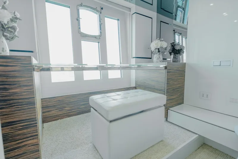 Scuderia Yacht Photos Pics Luxurious interior of 2010 Absolute 70 STY yacht with elegant seating and decor.