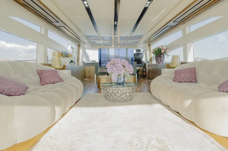 Scuderia Yacht Photos Pics Luxurious interior of 2010 Absolute 70 STY yacht with elegant seating and decor.