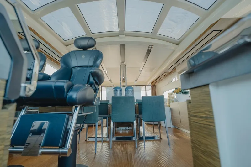 Scuderia Yacht Photos Pics Luxurious interior of 2010 Absolute 70 STY yacht with leather seating and modern design.