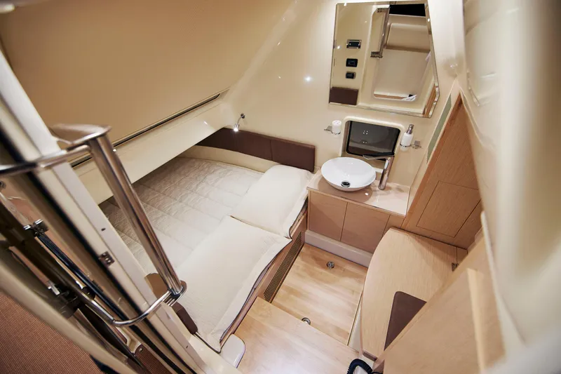  Yacht Photos Pics 2019 Chris-Craft Catalina 34 cabin interior with bed, sink, and modern amenities.