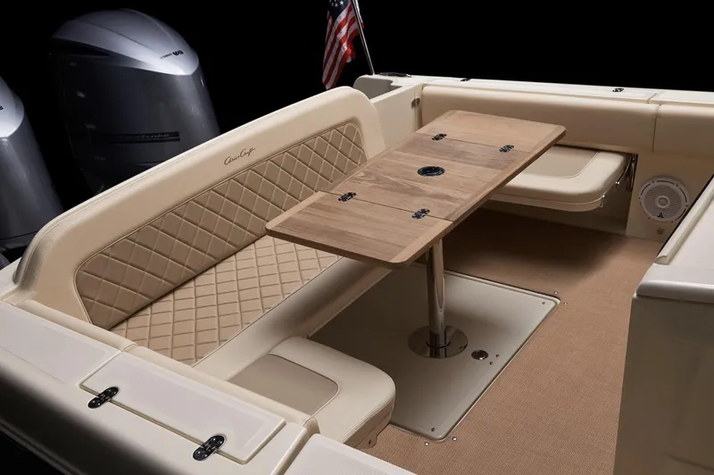  Yacht Photos Pics 2019 Chris-Craft Catalina 34 interior with elegant seating and wooden table.