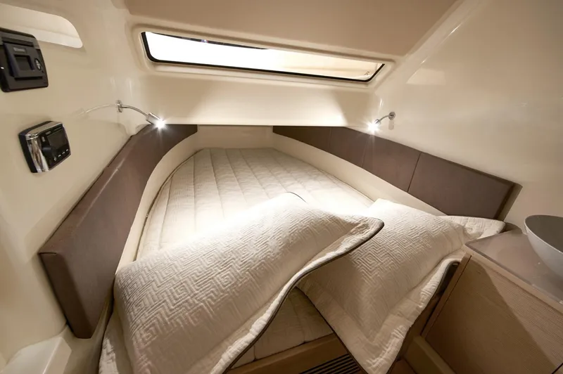  Yacht Photos Pics 2019 Chris-Craft Catalina 34 cabin interior with cozy bed and modern lighting.