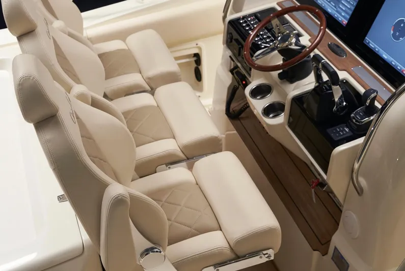  Yacht Photos Pics Luxurious helm seating and controls on 2019 Chris-Craft Catalina 34 boat.