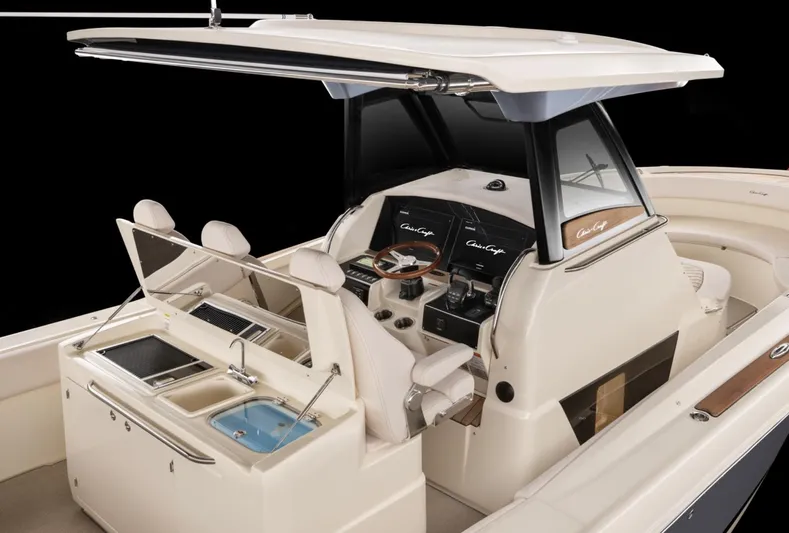  Yacht Photos Pics 2019 Chris-Craft Catalina 34 boat interior with helm and seating area.