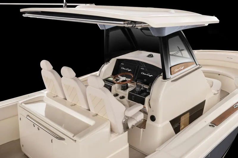 Yacht Photos Pics 2019 Chris-Craft Catalina 34 boat interior with helm, seating, and controls.