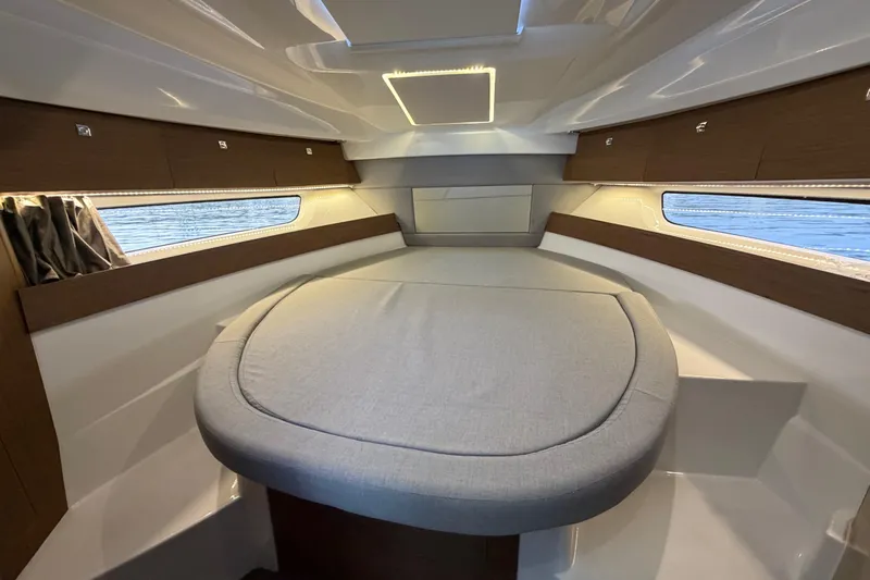  Yacht Photos Pics 2019 Jeanneau NC 895 cabin interior with modern design and comfortable seating.