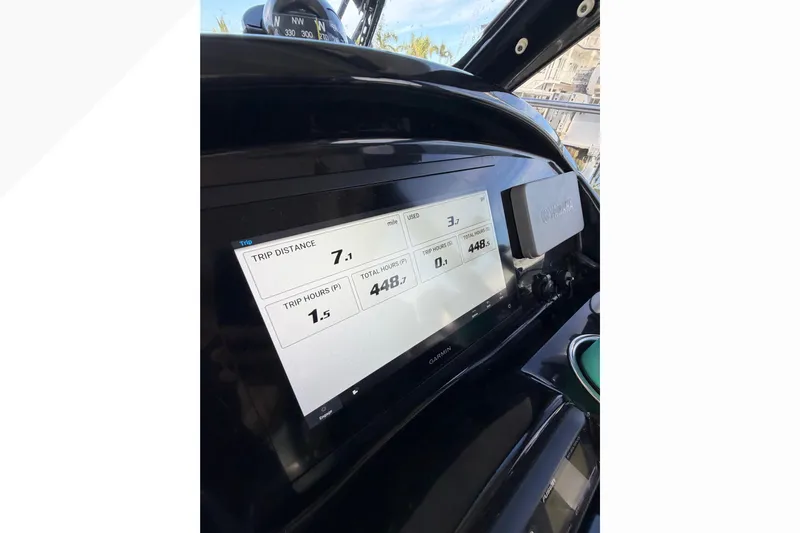  Yacht Photos Pics Dashboard of 2019 Jeanneau NC 895 boat showing trip data on Garmin display.