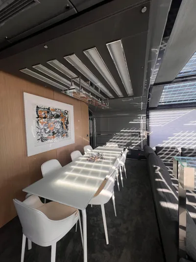  Yacht Photos Pics Luxurious interior of 2015 Arcadia Yachts A 85 with modern dining area and stylish decor.