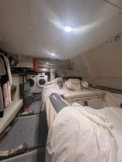  Yacht Photos Pics Laundry area and storage space inside 2015 Arcadia Yachts A 85.