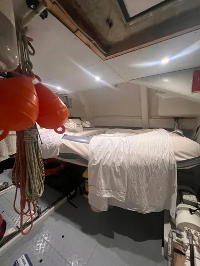  Yacht Photos Pics Interior of 2015 Arcadia Yachts A 85, featuring a cozy cabin with nautical equipment.