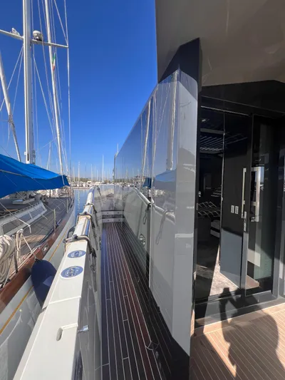  Yacht Photos Pics Side deck view of 2015 Arcadia Yachts A 85, docked in a marina.