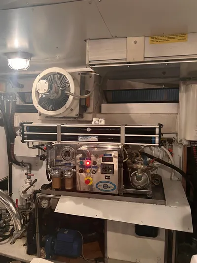  Yacht Photos Pics Engine room of 2015 Arcadia Yachts A 85, featuring mechanical equipment and control panels.