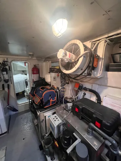  Yacht Photos Pics Engine room of 2015 Arcadia Yachts A 85, featuring tools and equipment.