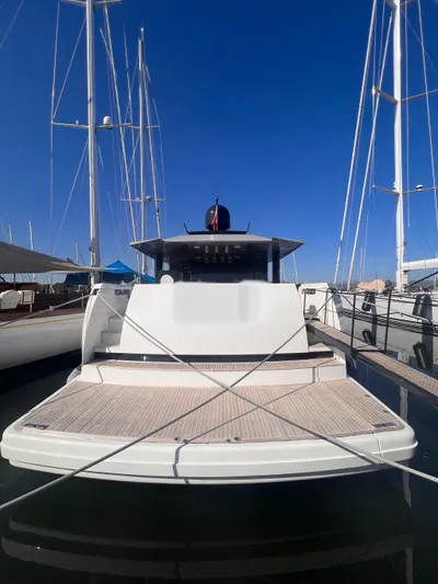  Yacht Photos Pics 2015 Arcadia Yachts A 85 docked, showcasing sleek design and spacious deck.