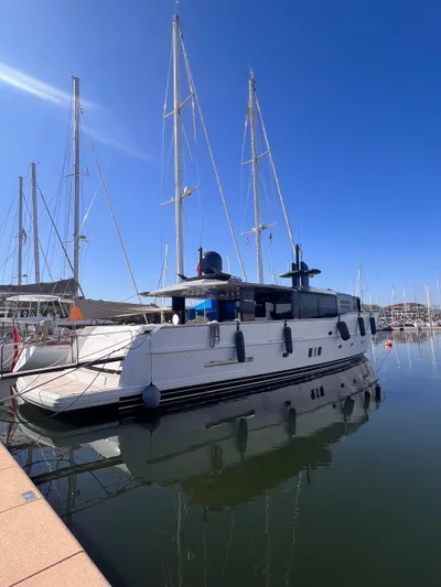  Yacht Photos Pics 2015 Arcadia Yachts A 85 docked in a marina under clear blue skies.