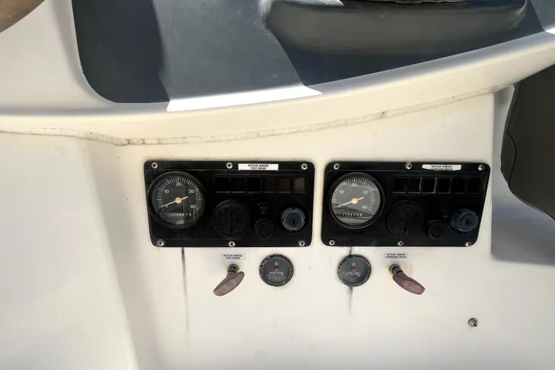  Yacht Photos Pics Control panel of 2002 Fountaine Pajot LAVEZZI 40 catamaran with gauges and switches.