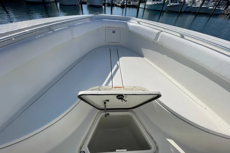  Yacht Photos Pics 2003 Hydra-Sports Vector 3300 CC boat interior with open storage compartment.