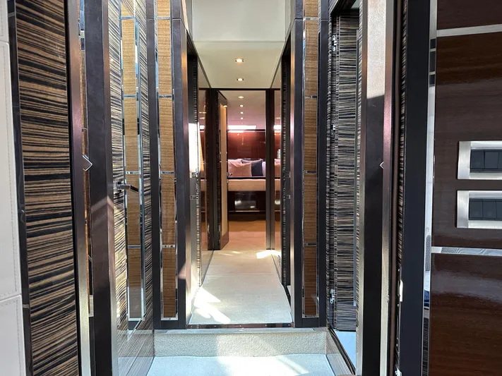 Bbella Yacht Photos Pics Luxurious interior hallway of 2014 Cheoy Lee Alpha 87 Express Sportbridge yacht.