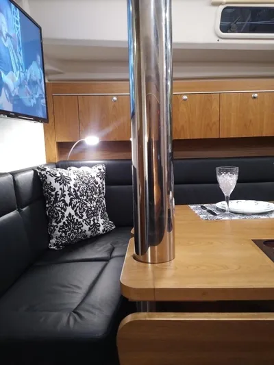  Yacht Photos Pics Interior of 2017 Hanse HANSE 415 yacht with elegant seating and dining area.