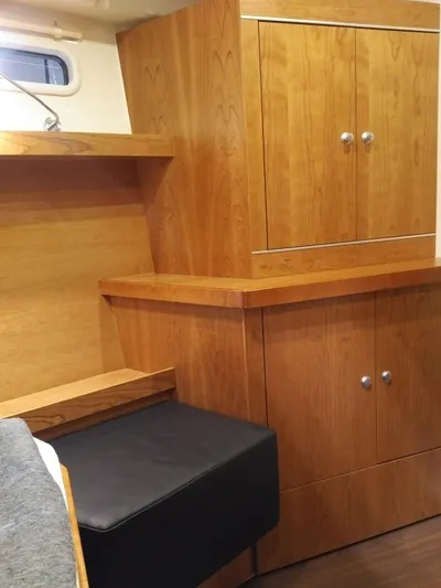  Yacht Photos Pics Interior of 2017 Hanse HANSE 415 yacht with wooden cabinetry and seating.