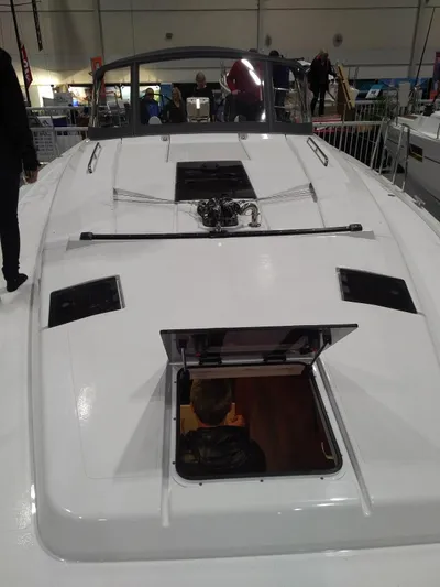  Yacht Photos Pics 2017 Hanse HANSE 415 yacht deck with open hatch at a boat show.