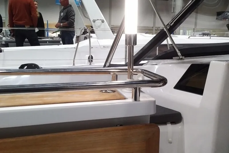  Yacht Photos Pics 2017 Hanse HANSE 415 yacht interior with stainless steel railings and wooden accents.