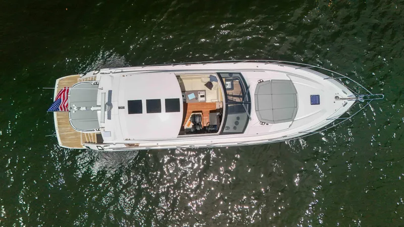 Arbitrage Yacht Photos Pics Aerial view of 2017 Sunseeker Predator 57 yacht on water.
