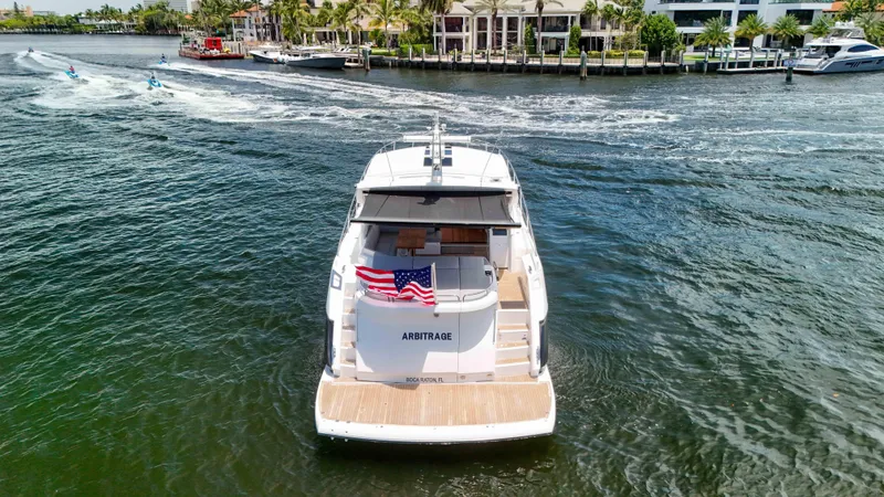 Arbitrage Yacht Photos Pics 2017 Sunseeker Predator 57 yacht cruising in a scenic waterway.