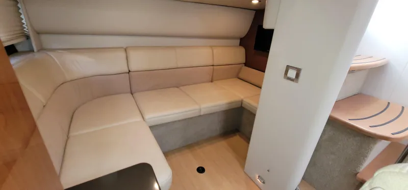  Yacht Photos Pics Interior of 2012 Formula 37 Performance Cruiser with beige sofa.