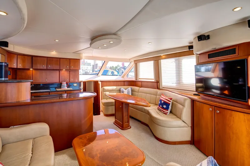  Yacht Photos Pics Luxurious interior of a 2006 Silverton 50 Convertible yacht with elegant wood finishes.