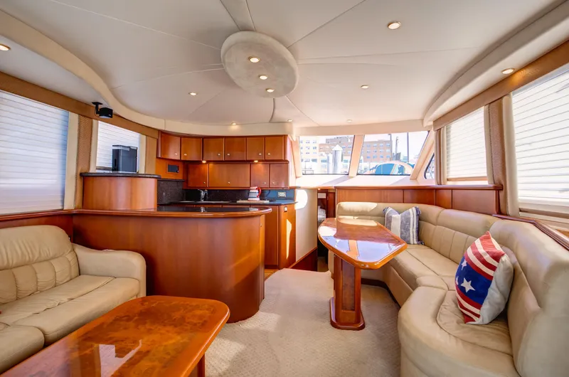  Yacht Photos Pics Luxurious interior of a 2006 Silverton 50 Convertible yacht with elegant wood finishes.