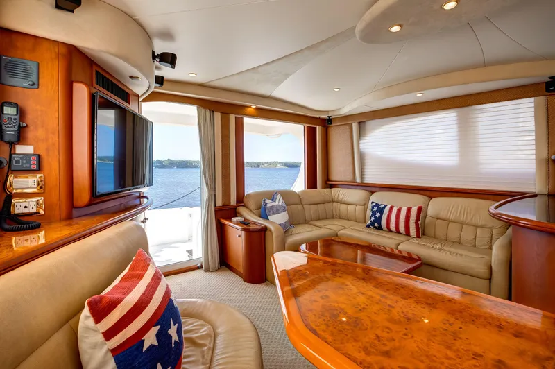  Yacht Photos Pics Luxurious interior of 2006 Silverton 50 Convertible yacht with plush seating and nautical decor.