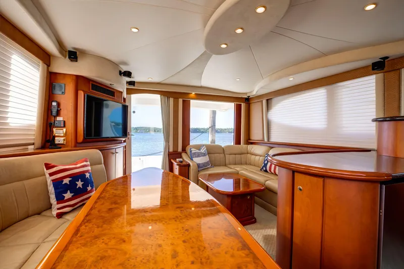  Yacht Photos Pics Luxurious interior of a 2006 Silverton 50 Convertible yacht with elegant wood finishes.